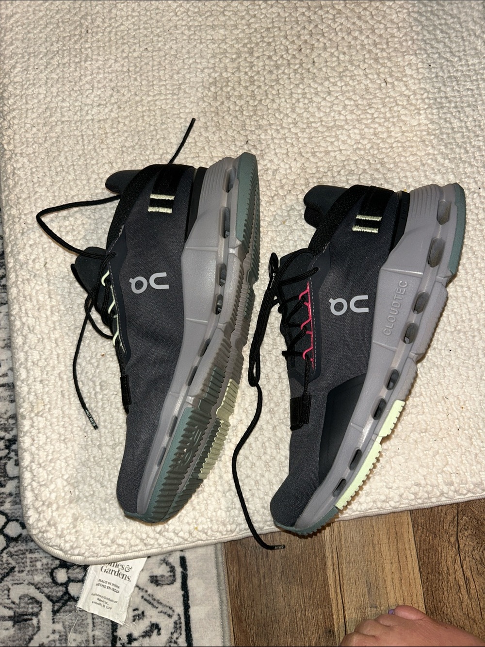 On Running Women’s Athletic Shoes in Black with Gray and Green Accents